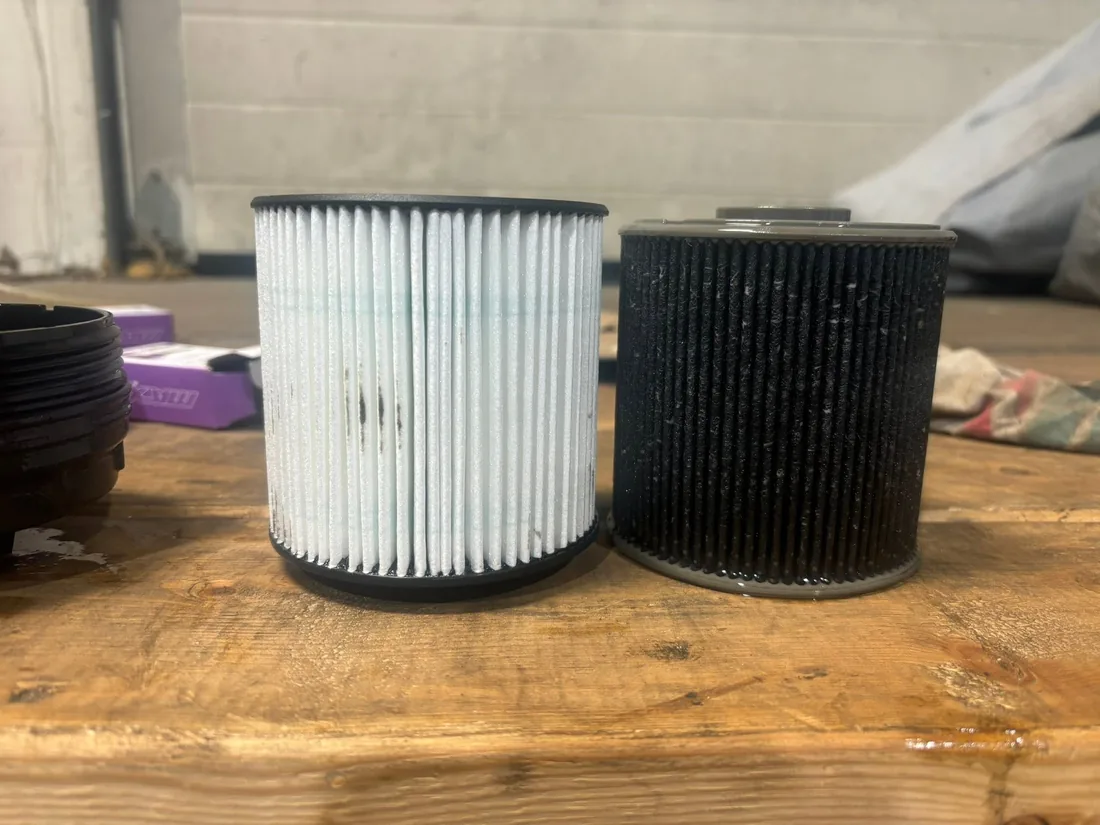 Two oil filter cartridges side by side on the workbench at AutoNorth in North Bay